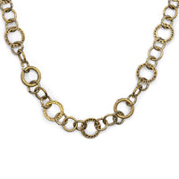 Antiqued bronze lariat style necklace with chain hanging