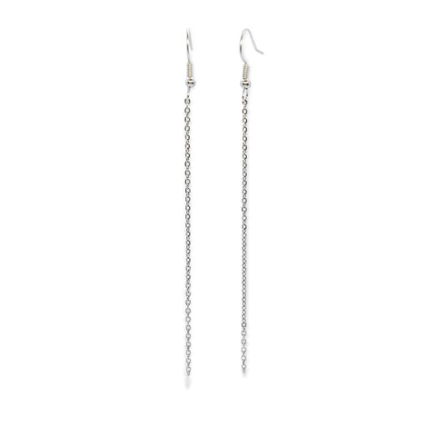 Silver tone chain earrings dangling on earring hook.