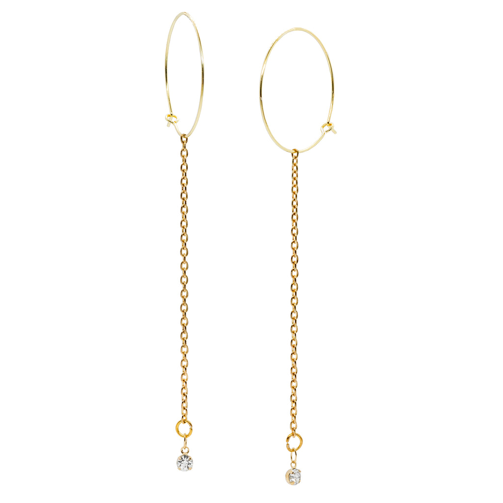 Gold hoops facing straight and three quarter,  with dangling chain. A cubic zirconium stone is on the bottom of the chain. Image on a white background