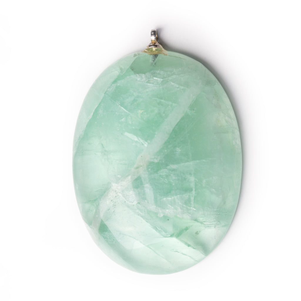 Aventurine cabochon on solid white background.