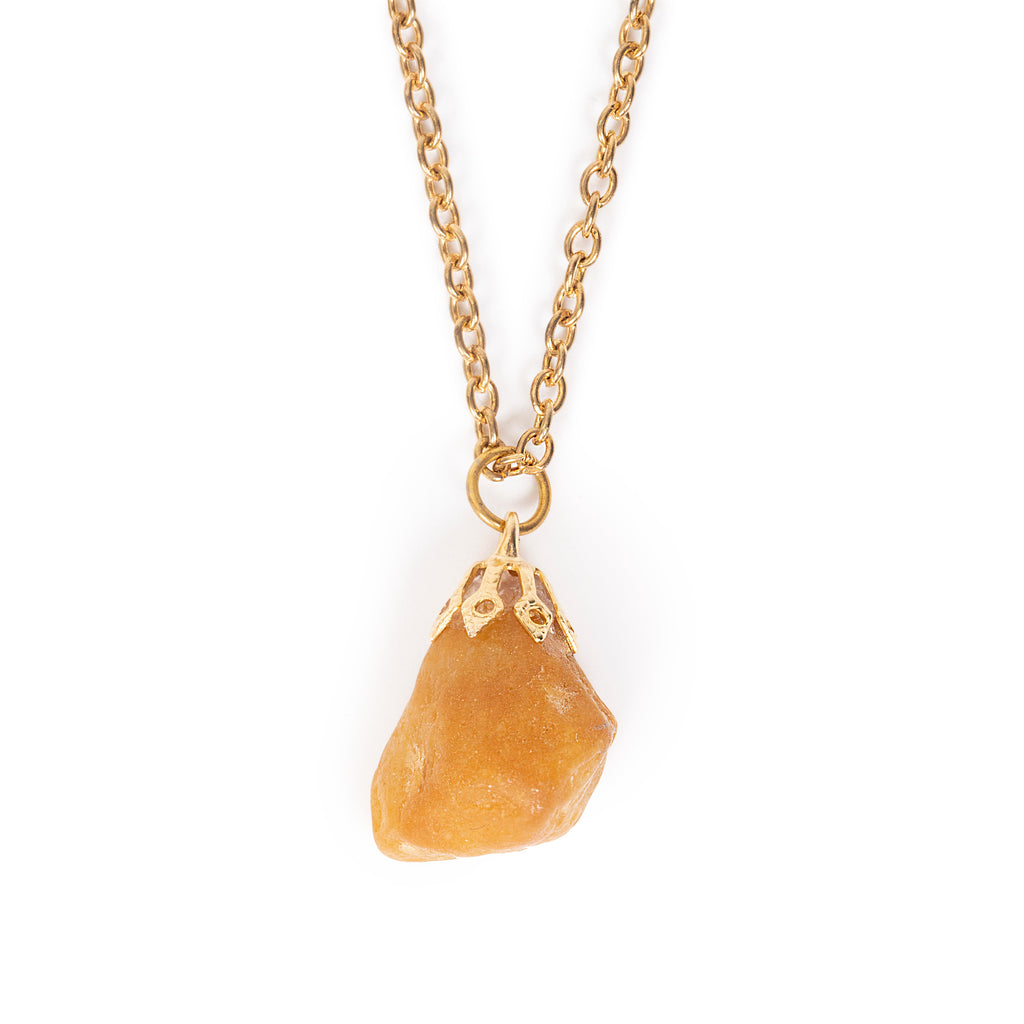 A mid size yellow/gold stone, hanging on gold bail and chain. Image has a solid white background.