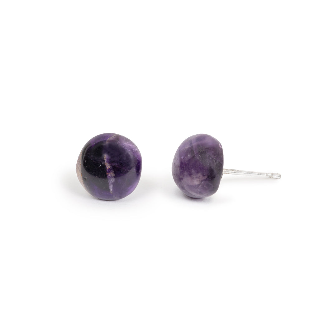 Amethyst cabs on imitation silver posts, sitting on solid white background.