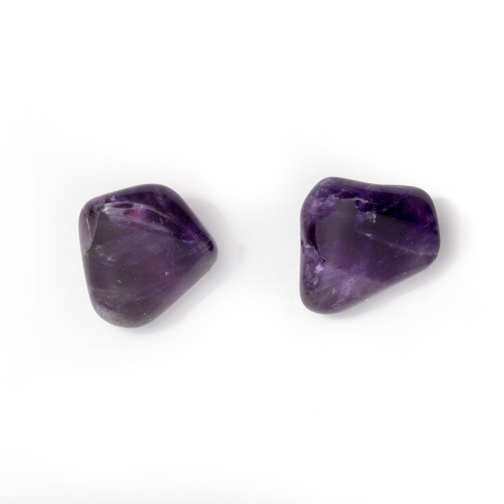 Amethyst tumbled earrings on solid white background