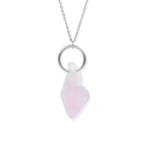 Rough Cut Rose quartz pendant hanging on large silver loop and silver chain