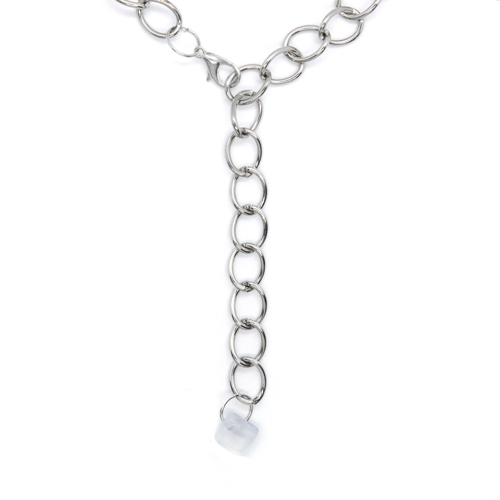 Silver tone lariat style necklace with moonstone hanging at bottom