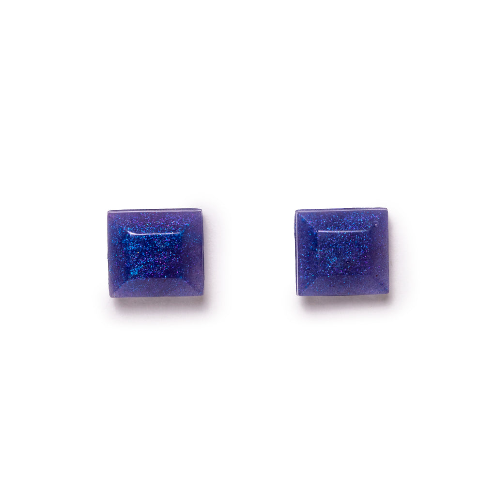 Blue Purple glittery square earrings, both facing forward. Image is on a solid white background.