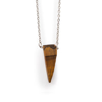 Tiger Eye Pendant hanging on silver chain