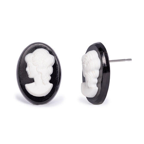 Black and white cameo earring on solid white background. 