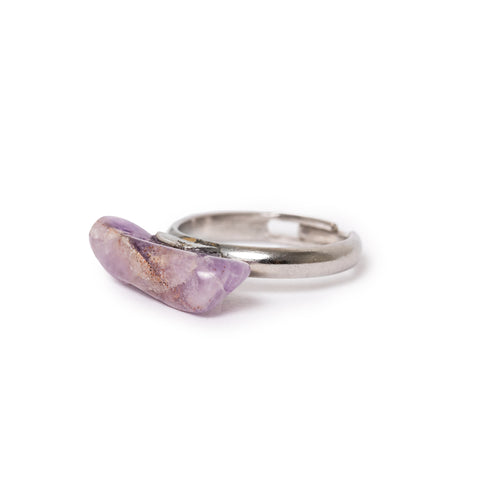 3/4 view of amethyst bar on silver tone adjustable band ring. Image is on solid white background. 