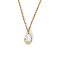 Clear faceted glass charm hanging on gold chain, on solid white background.