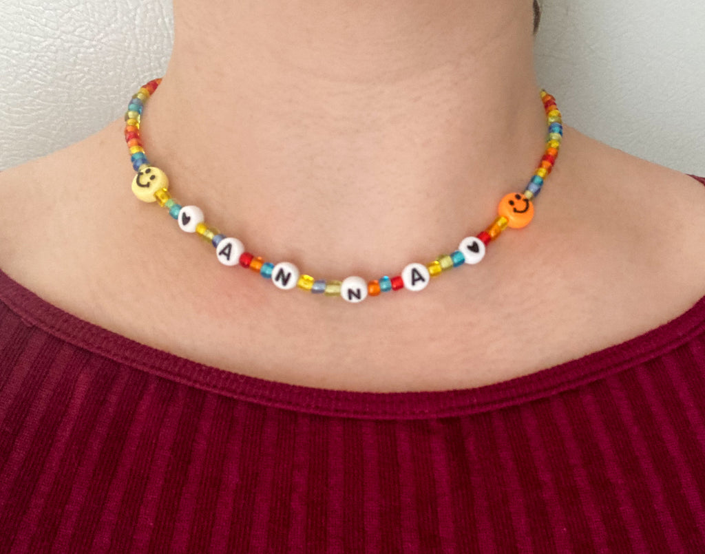 Model wearing Anna necklace showing the fit around neckline, beaded all the way to back.