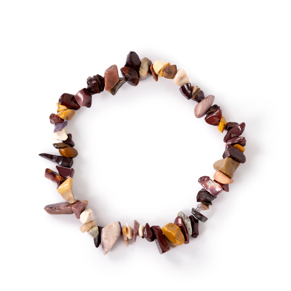Mookaite jasper chip bracelet in assorted tones, laying on a solid white background.