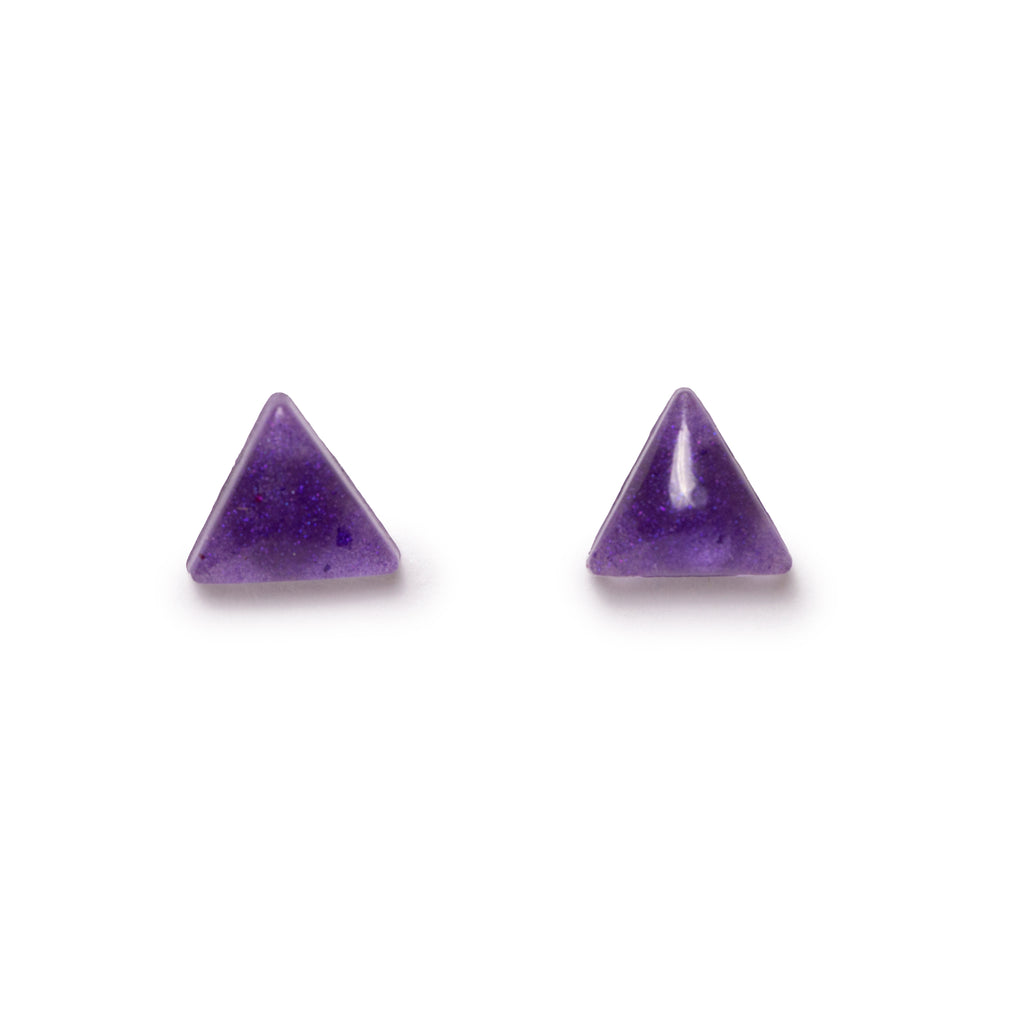 Small purple resin earrings on solid white background