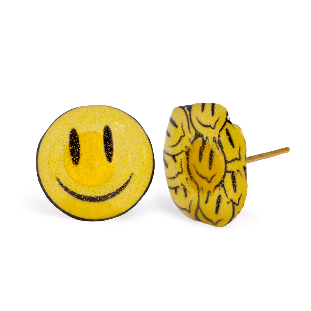 Smiley earrings standing on solid white background. 